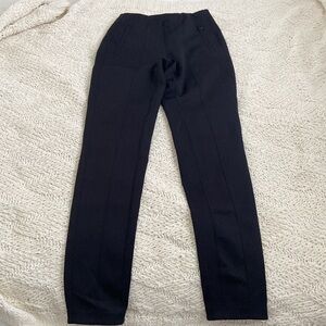 Lululemon black pants vertical front zip pockets women 6 like new